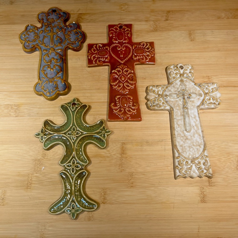 Set of 4 Ceramic Decorative Embossed Wall Crossed Tan, Blue, Rust, and Green